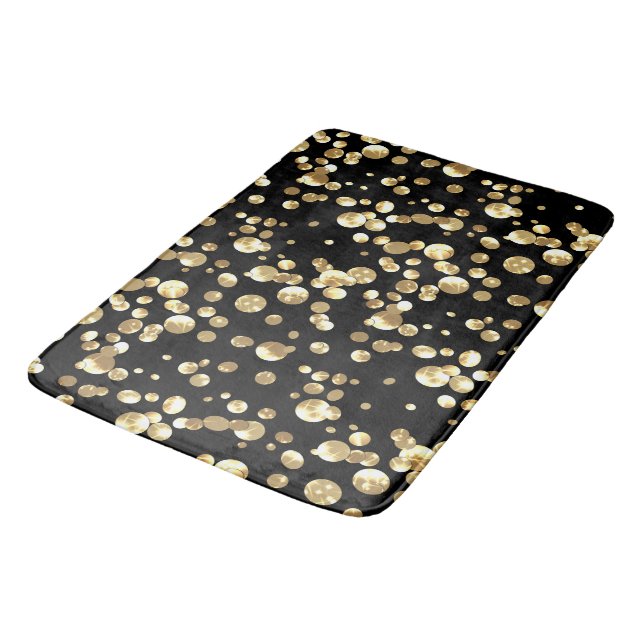 Gold polka dots on a black background . bath mat (Angled)