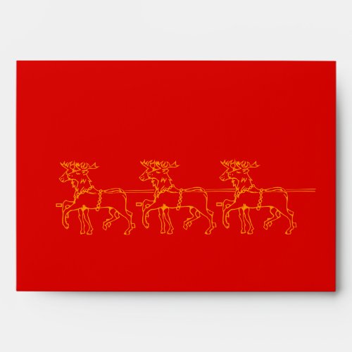 gold reindeer graphic design red seasonal envelope