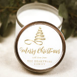 Gold Ribbon Tree Merry Christmas Script Classic Round Sticker<br><div class="desc">This modern holiday sticker features a gold ribbon Christmas tree above the words "Merry Christmas" in stylish gold-colored calligraphy script. Personalize it with your family's name in serif font.</div>