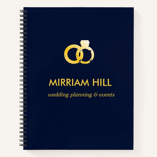 Gold rings dark blue wedding planner notebook (Front)