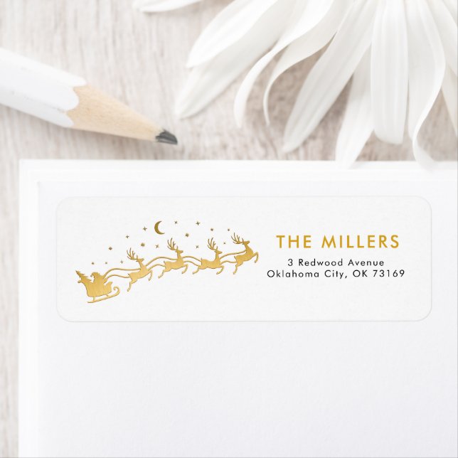 Gold Santa flying in a sleigh with reindeer  Label (Insitu)