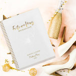 Gold Script Future Mrs. Wedding Planner<br><div class="desc">Romantic design features a soft floral flower in white,  "Future Mrs.",  and the words "Wedding Plans" in a gold typography script against a white textured background.  Easily customize your names and date of choice.  The perfect gift idea for the bride-to-be to organize all her wedding planning needs.</div>