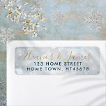 Gold Script Name Winter Snow Scene Return Address Label<br><div class="desc">Snowflakes fall across your name(s) or family name,  set in a chic gold script and return address set over a winter frost background on this elegant return address label.</div>