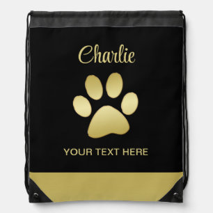 Gold Shiny Dog Paw on black background Drawstring Bag