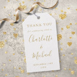 Gold Signature Script Wedding Favor Thank You Gift Tags<br><div class="desc">Featuring signature style names,  this elegant gold and white tag can be personalized with your special thank you information in chic gold lettering. Designed by Thisisnotme©</div>