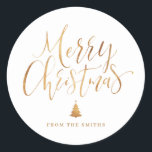 Gold Simple Calligraphy Merry Christmas Classic Round Sticker<br><div class="desc">Personalized Christmas gift stickers feature big faux gold foil handwritten calligraphy and Christmas tree,   simple,  modern and elegant.</div>