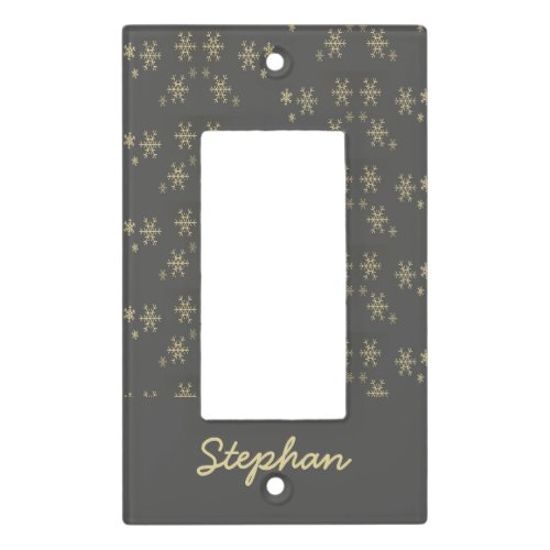 Gold snowflakes on gray light switch cover