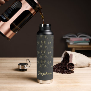 Gold snowflakes on gray water bottle