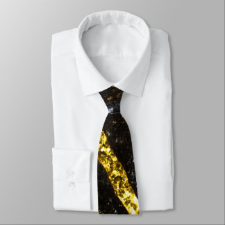 Gold sparkly line on black rock neck tie