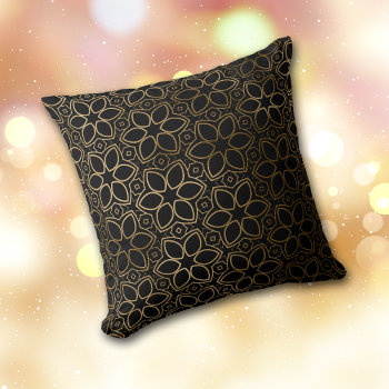 Gold Starflower Pattern On Black Throw Pillow by AvenueCentral at Zazzle