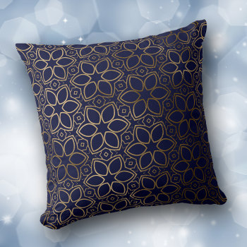Gold Starflower Pattern On Blue Throw Pillow by AvenueCentral at Zazzle