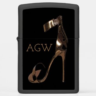 Gold stiletto high heeled shoe with monogram