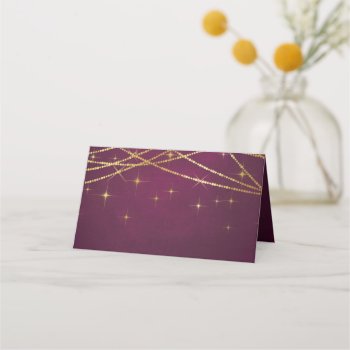 Gold String Lights On Ruby Place Card by Charmalot at Zazzle