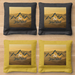 Gold sunrise personalizable mountains monogram cornhole bags