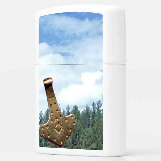Gold Thor Hammer trees resting white Zippo Lighter (Left)