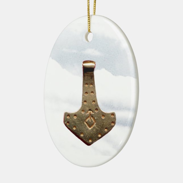 Gold Thor's Hammer clouds oval ceramic ornament (Left)