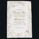 Gold Toile De Jouy Bridal Shower Favors Medium Gift Bag<br><div class="desc">Elevate your celebrations with our gold Toile party decor, featuring detailed floral french country toile on a warm white background. This regency-inspired Chinoiserie design exudes elegance and sophistication. ★ Let me help you plan your next party! ★ If you need coordinating décor, please check my matching collection. If you have...</div>