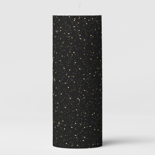 Gold tone glitter and sparkles on black pillar candle