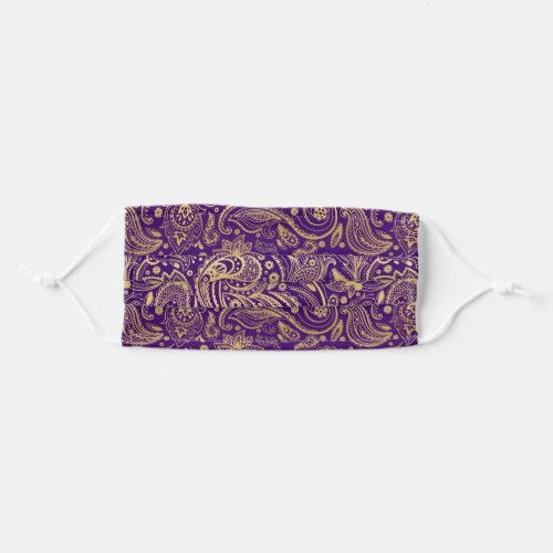 Gold tones paisley on purple adult cloth face mask