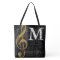 Gold treble clef music note monogram with name