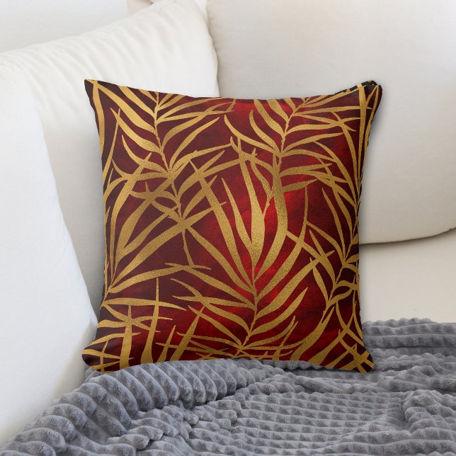 Gold Tropical Leaves on Burgundy Red Throw Pillow (Creator Uploaded)
