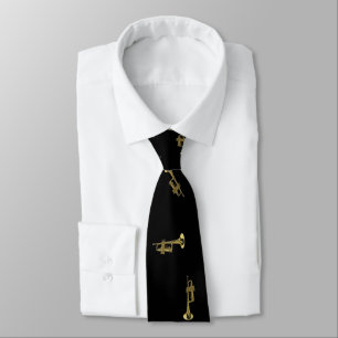 gold trumpet on black tie