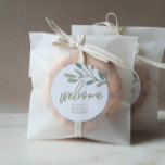 Gold Veined Eucalyptus Welcome Wedding Classic Round Sticker<br><div class="desc">These gold veined eucalyptus welcome wedding stickers are perfect for an elegant wedding. The simple and dainty design features faux gold glitter layering the branches of olive green leaves. Personalize the sticker labels with your names, the event (if applicable), and the date. Please Note: This design does not feature real...</div>