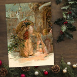 Gold Vintage Father Christmas and Angel Holiday Card<br><div class="desc">Old world Father Christmas in heavily ornamented gold robes bearing gifts and tree with winged angel. Beautiful complementary graphics on back with editable text fields.</div>