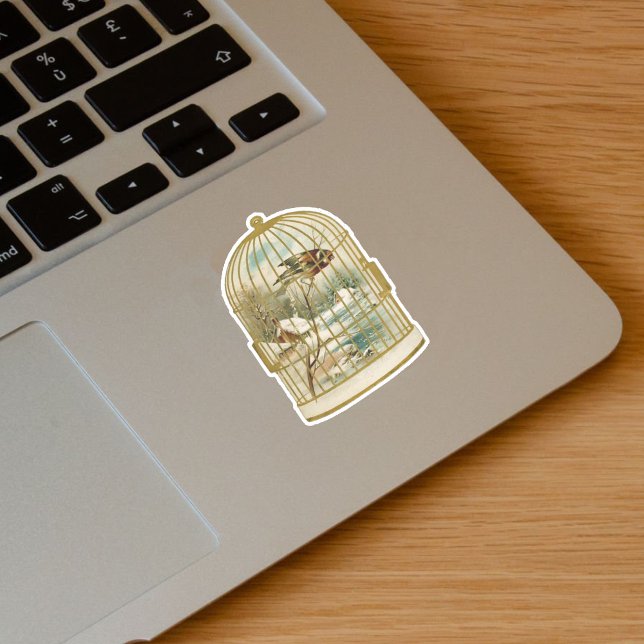 Gold White Birdcage With Bird on Branch Cabin Snow Sticker (Golden birdcage with bird overlooking winter cabin scene snow on vinyl sticker.)