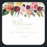 Gold Wild Feather Boho Tropical Wedding Welcome   Square Sticker<br><div class="desc">This gold wild feather boho tropical wedding welcome square sticker is perfect for a rustic wedding. The design features hand-painted brown wild feathers, boho yellow, white, purple, pink, blush, burgundy flowers and blue berries neatly arranged into beautiful bouquets. These labels are perfect for hotel guest welcome bags and destination weddings....</div>