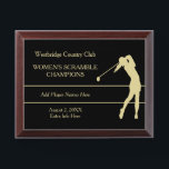 Gold Woman Golfer Tournament Champion Award Plaque<br><div class="desc">A gold silhouette woman golfer takes a swing on this tournament champion award plaque. Your custom text is in matching gold at the left side. Everything is placed on a dramatic black background. Easy to customize to your needs.</div>
