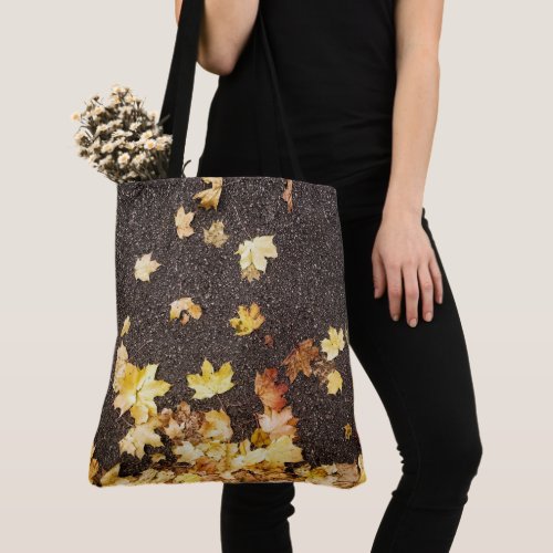 Gold yellow maple leaves autumn asphalt road tote bag