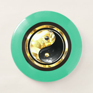 Gold Yin Yang on black Wham-O Frisbee