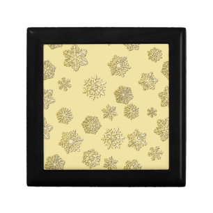 Golden 3-d snowflakes on a gold background gift box