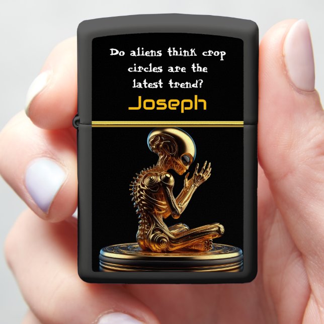 Golden Alien Contemplates Existence Zippo Lighter (In Hand)
