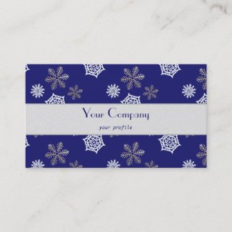 golden and white snowflakes against midnight blue