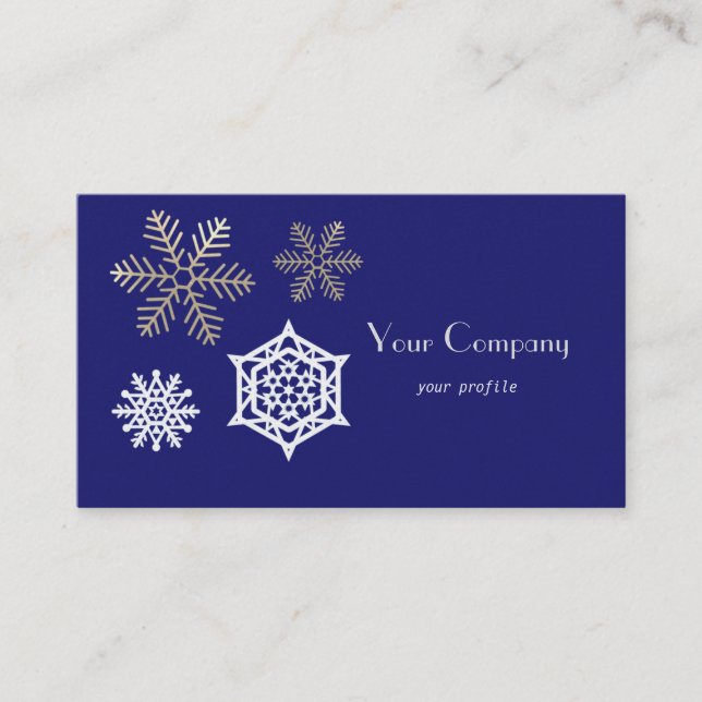 golden and white snowflakes against midnight blue business card (Front)
