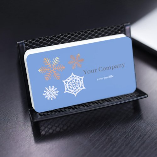golden and white snowflakes in light blue  business card