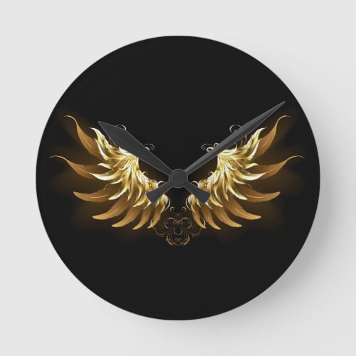 Golden Angel Wings on Black background Round Clock
