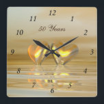 Golden Anniversary Hearts Square Wall Clock<br><div class="desc">Wall clock with my artwork of an all-golden and yellow scene with two golden hearts floating on water. Customizable text says "50 Years".</div>