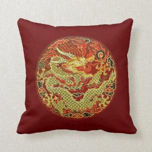 Golden asian dragon embroidered on dark red throw pillow