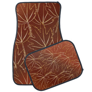 Golden autumn leaves pattern on brown car floor mat
