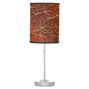 Golden autumn leaves pattern on brown table lamp