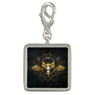 Golden Bird Skull on Black background Charm