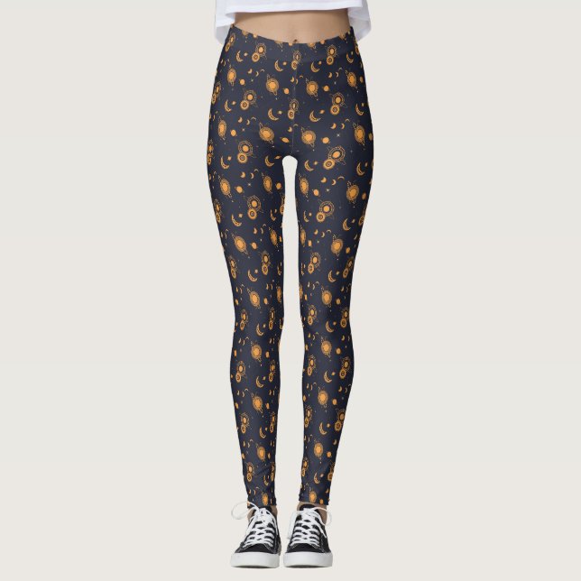 Golden black celestial sun moon galaxy pattern leggings (Front)