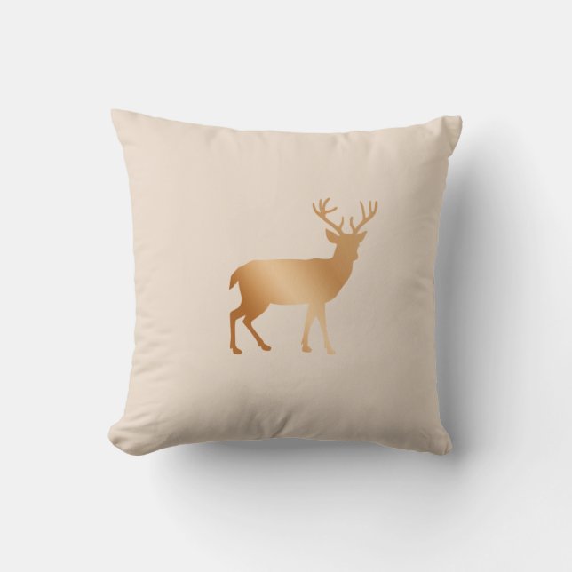 Golden brown reindeer silhouette on beige throw pillow (Front)