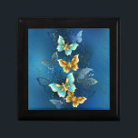 Golden butterflies gift box<br><div class="desc">Composition of flying,  jewelry,  gold and dark butterflies on textured jewelry background. Golden butterfly.</div>