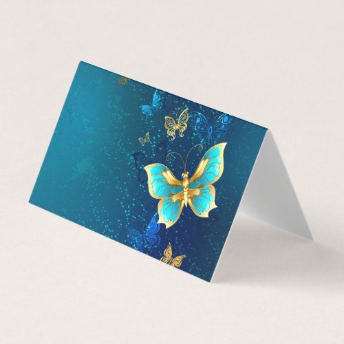 Golden Butterflies on a Blue Background