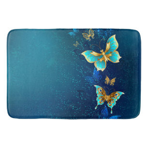Golden Butterflies on a Blue Background Bath Mat