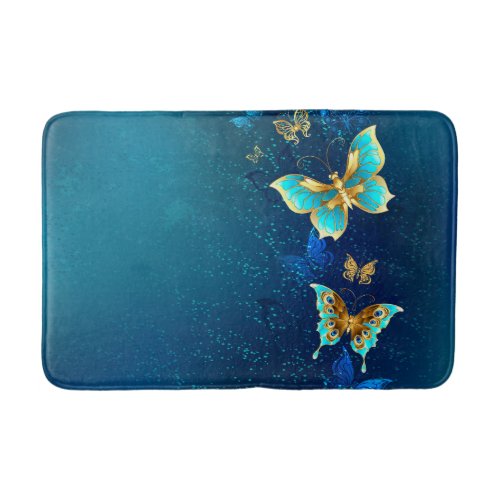 Golden Butterflies on a Blue Background Bath Mat